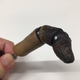 Image for article titled Resident Evil 7 USB Doll Finger Looks Like A Burnt Penis